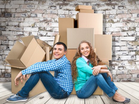 Boxes and household items being organised for transport