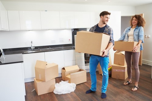 Removal van and team handling flat move access in Fulham