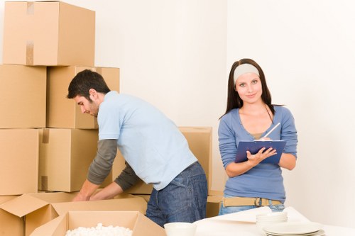 Professional movers loading furniture for a Fulham relocation