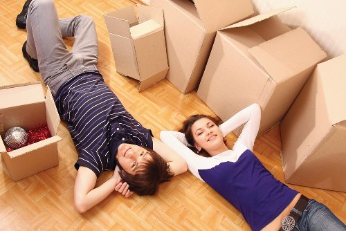 Unpacking boxes and arranging items in a new Fulham property