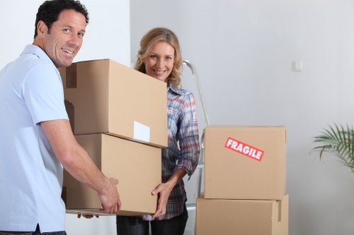 Local movers handling a business move on a Fulham street