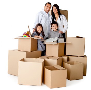 Packed moving boxes and furniture ready for transport in Fulham